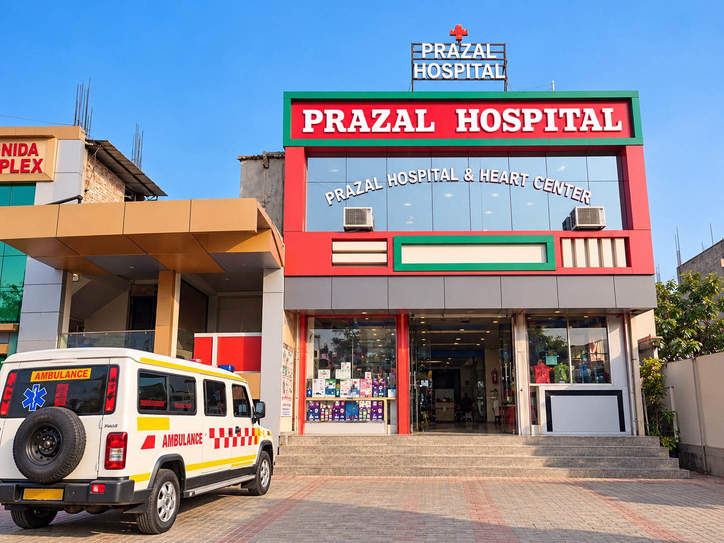 Prazal Hospital entrance with an ambulance